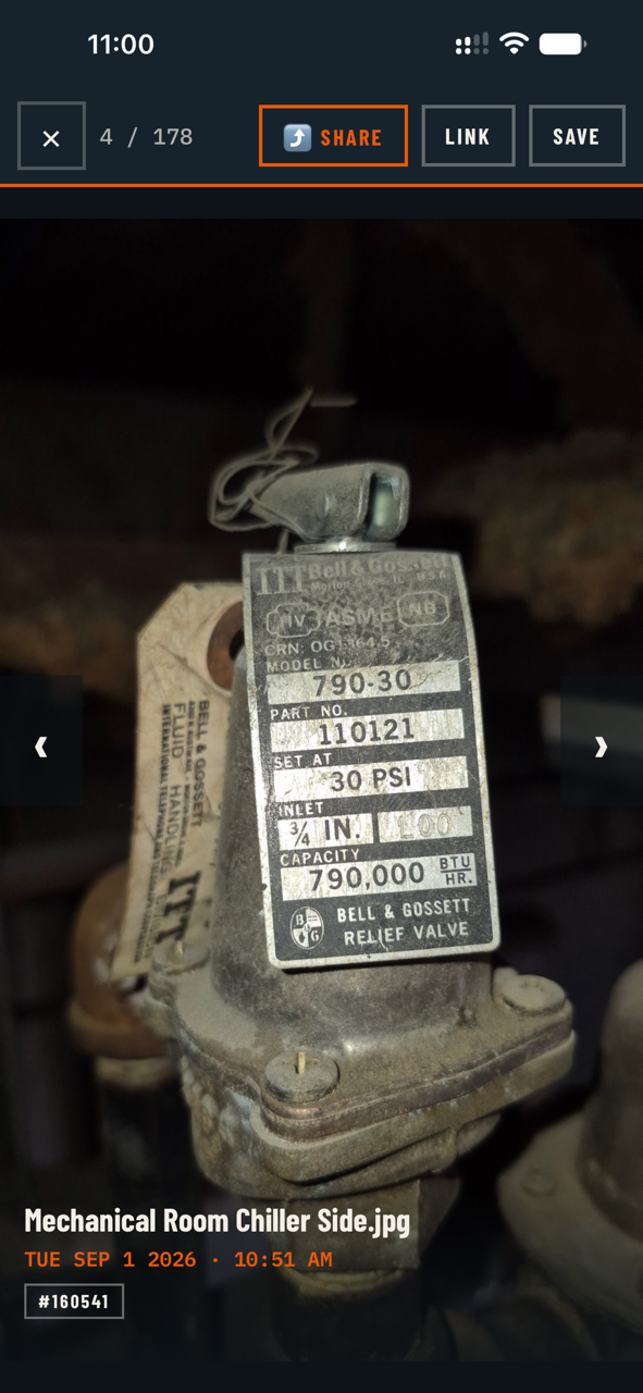 A dataplate photo, fully legible: make, model number, part number, pressure setting and BTU capacity.
